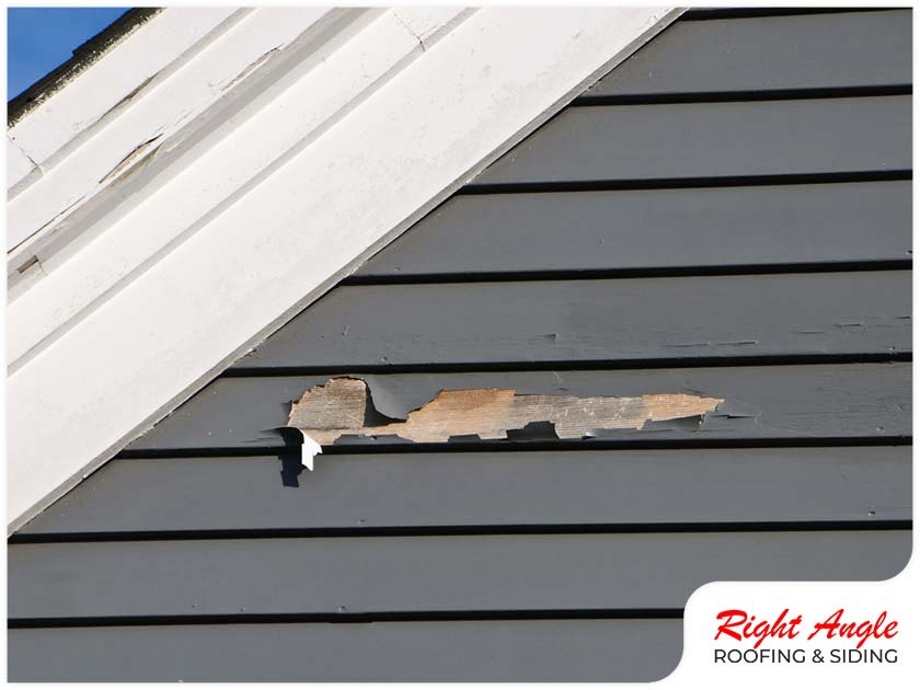 When to Repair or Replace Your Siding